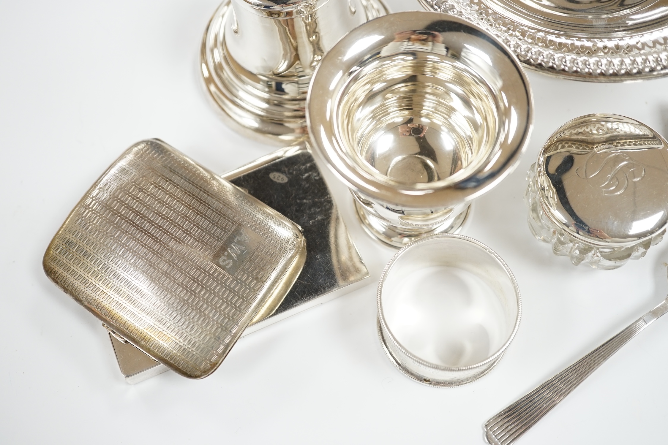 Sundry small silver including a bell shaped inkwell, modern card case, cigarette case, small spoon, napkin ring, pill box, sterling bowl etc.